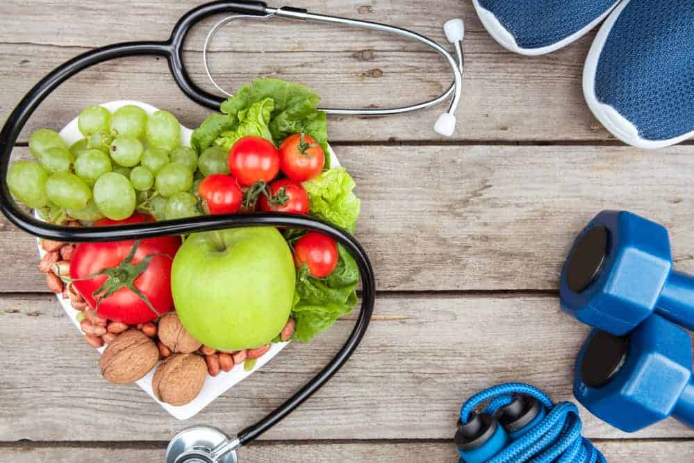  Frutta, manubri e uno stetoscopio