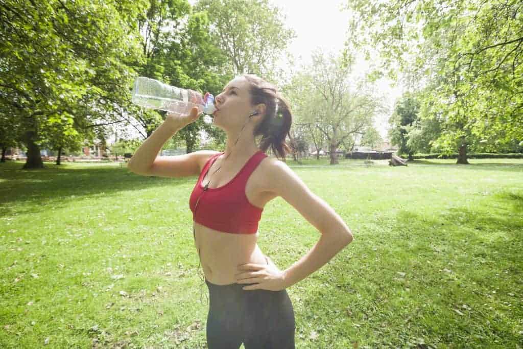  woman drinks water
